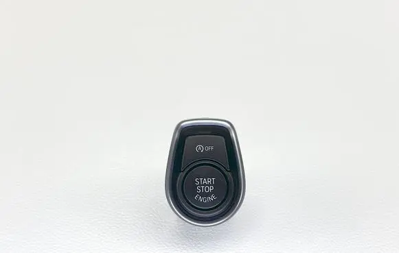 Engine start stop button switch