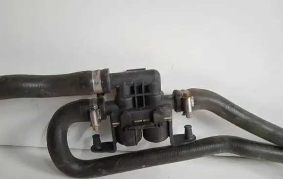 Coolant heater control valve