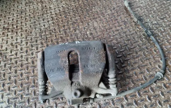 Volkswagen Golf VII Front brake caliper