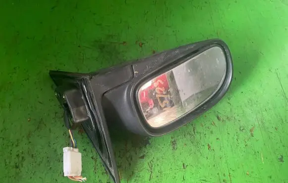 Suzuki Baleno EG Front door electric wing mirror