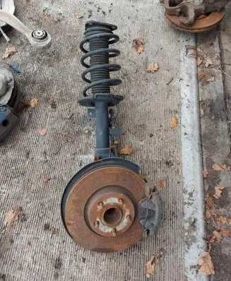 Ford Connect Front shock absorber with coil spring MCPHERSON