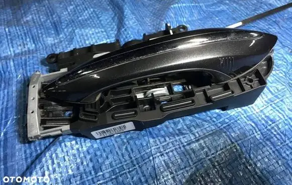 Rear door exterior handle/bracket