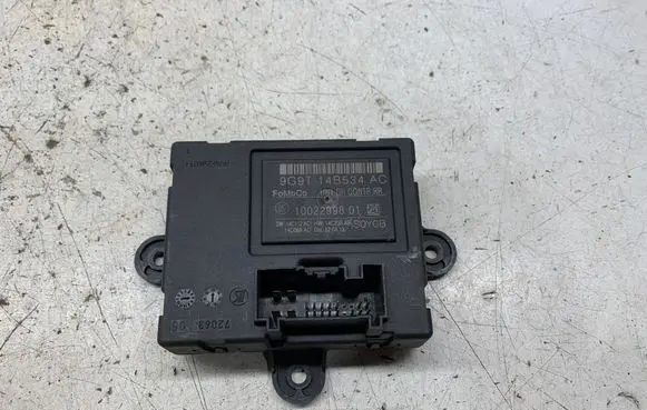 Volvo V70 Door control unit/module 9G9T14B534AC 1002299801 10057280
