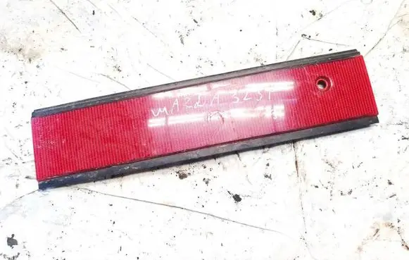 Mazda 323 F Trunk door license plate light bar 0674434 067-4434