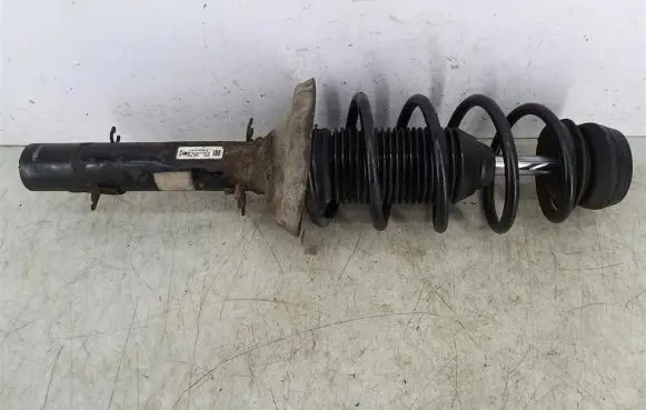 Volkswagen Golf IV Front shock absorber with coil spring 1J0413031S