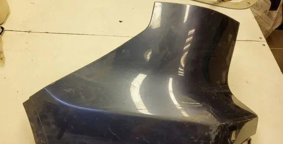 Rear bumper corner part panel trim