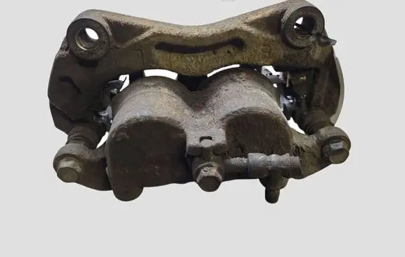 Nissan Qashqai+2 Front brake caliper