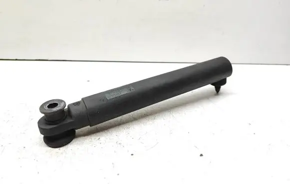 Tailgate check strap stopper