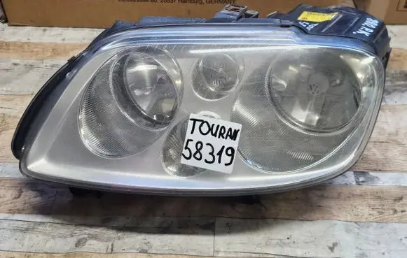 Volkswagen Touran I Headlight/headlamp 1T0941005R 301205203