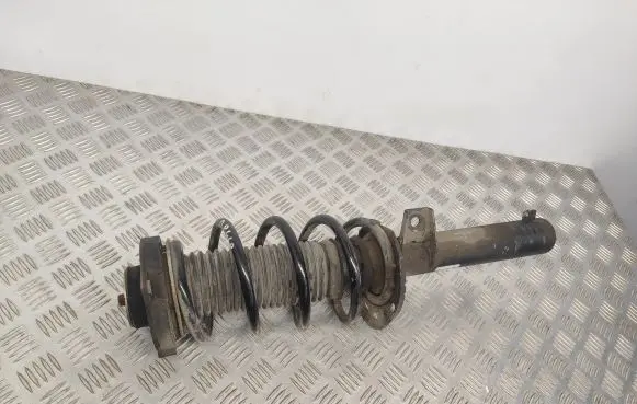 Volkswagen Jetta VI Front shock absorber with coil spring 5C0413031DK