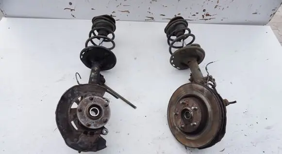 Front wheel hub spindle knuckle