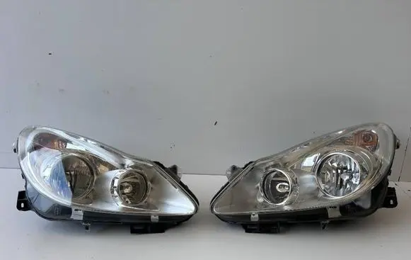 Opel Corsa D Headlights/headlamps set 13186381 13186382