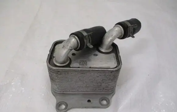 KIA Ceed Engine oil radiator 264102U000
