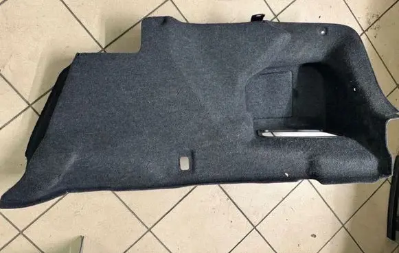 Trunk/boot lower side trim panel
