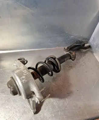 Front shock absorber with coil spring