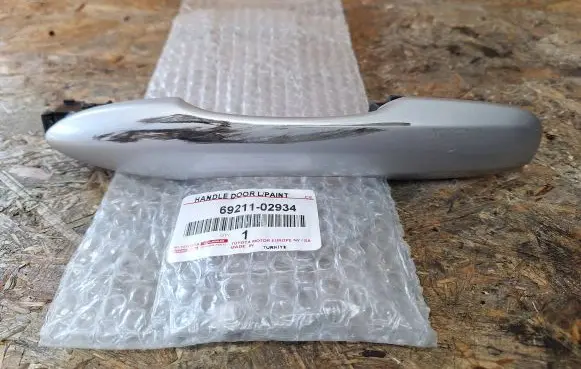 Toyota Corolla E210 E21 Front door exterior handle 69211-02934