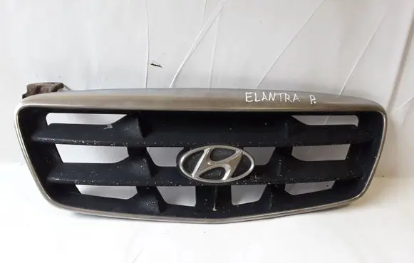Hyundai Elantra Front bumper upper radiator grill 863512D000
