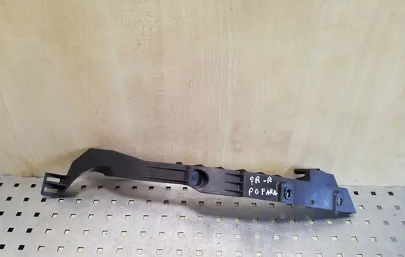 Opel Astra J Headlight/headlamp mounting bracket 13287640