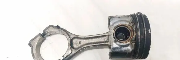 Piston with connecting rod