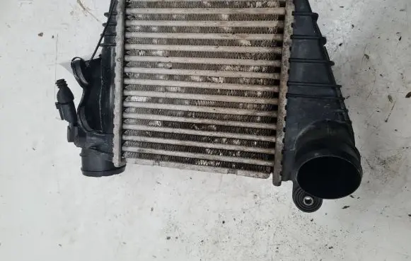 Volkswagen Golf IV Intercooler radiator 1J0145803F
