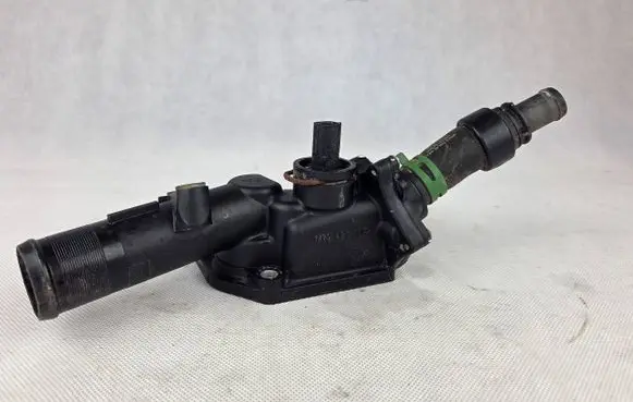 Thermostat/thermostat housing