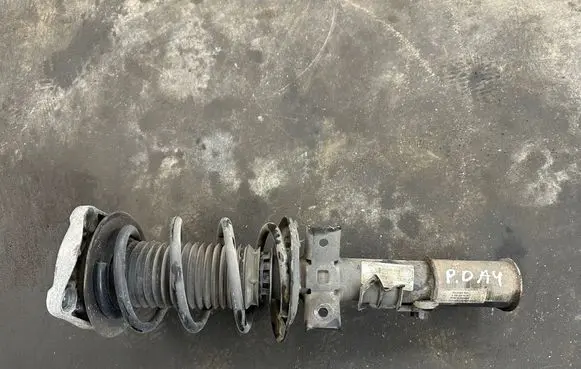 Front shock absorber with coil spring