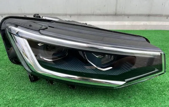 Volkswagen Tiguan Headlight/headlamp 55G941036C 01602512
