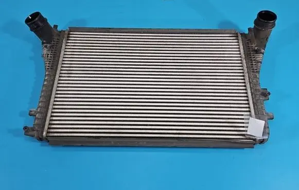 Volkswagen Touran I Intercooler radiator 1K0145803BN IMPRK1578916