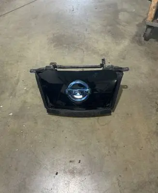 Nissan Leaf I (ZE0) Electric car charge socket cover 657103NA1A