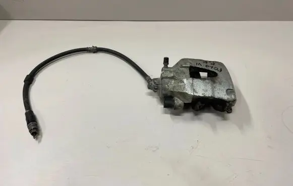 Volkswagen Polo VI Front brake caliper
