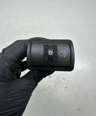Headlight level height control switch