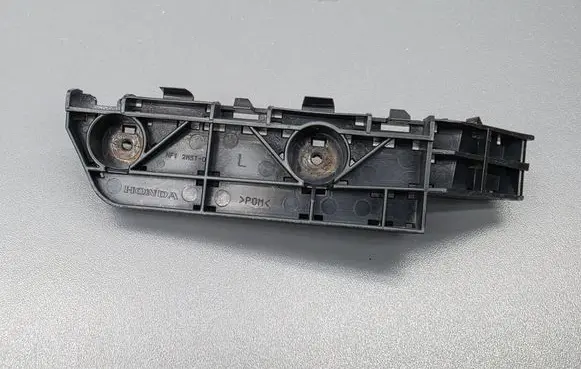 Front bumper mounting bracket