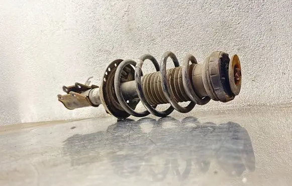 Opel Astra J Front shock absorber with coil spring 13354031