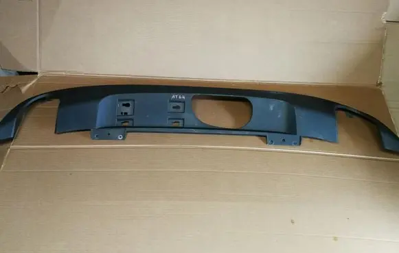 Rear bumper trim bar molding