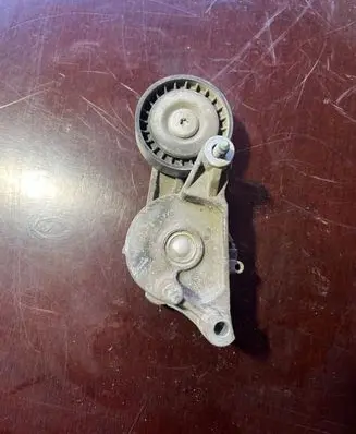 Volkswagen PASSAT B6 Alternator belt tensioner 03G903315