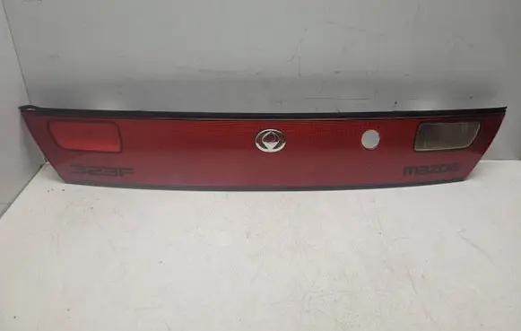 Mazda 323 F Trunk door license plate light bar 0431441