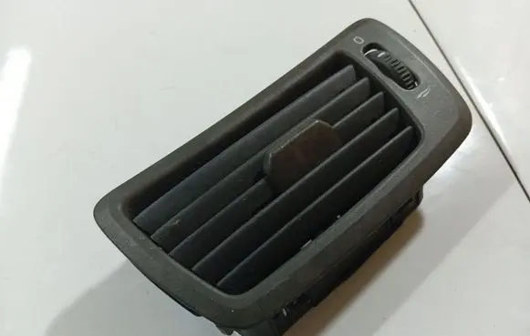 Dash center air vent grill