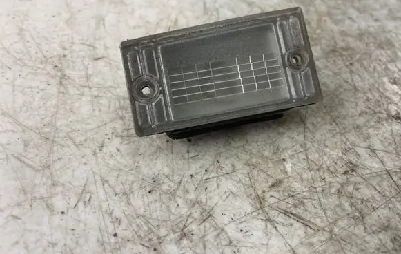 KIA Carens I Number plate light