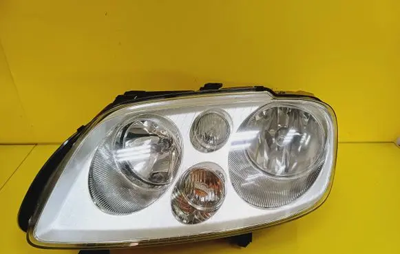 Volkswagen Touran I Headlight/headlamp 0301205201 1T0941005D