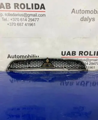 Mitsubishi Lancer VIII Front bumper upper radiator grill 7450A093