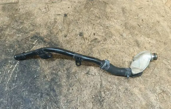 Volkswagen Golf VII Engine coolant pipe/hose 06K121085M