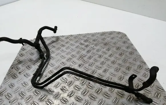Volkswagen PASSAT B5 Engine coolant pipe/hose 8D0203523B