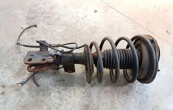 Cadillac STS Seville Front shock absorber with coil spring 22149717 6079691