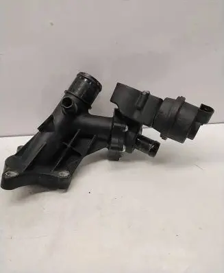 Thermostat/thermostat housing