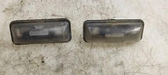Subaru Impreza III Number plate light 30903