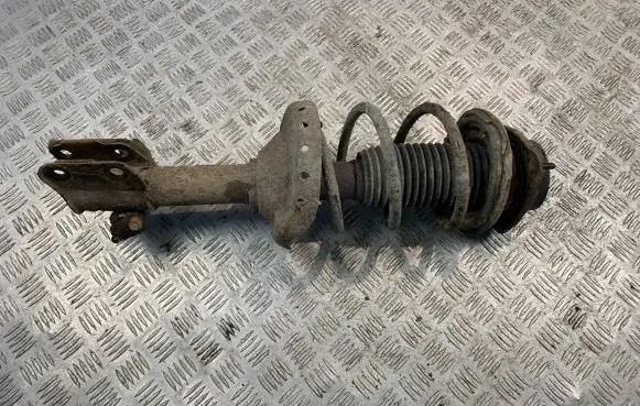 Subaru Forester SG Front shock absorber with coil spring