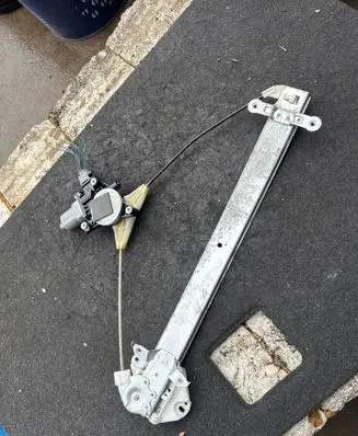 Subaru Outback Front door window regulator with motor 11112220