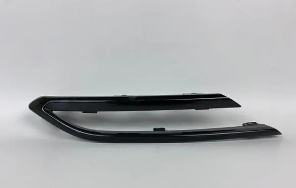 Rear bumper trim bar molding