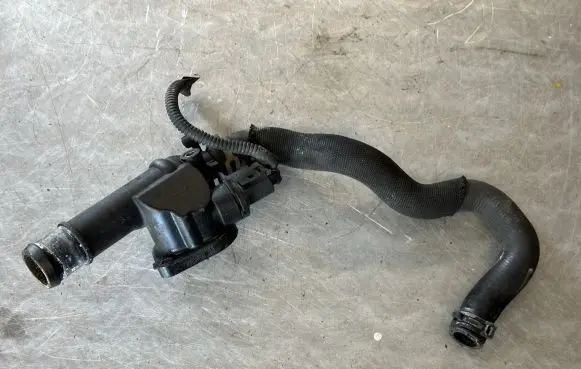Thermostat/thermostat housing