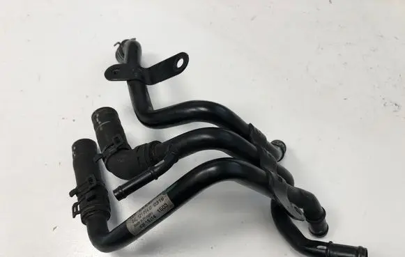 Volkswagen Golf VII Engine coolant pipe/hose 04L121064G